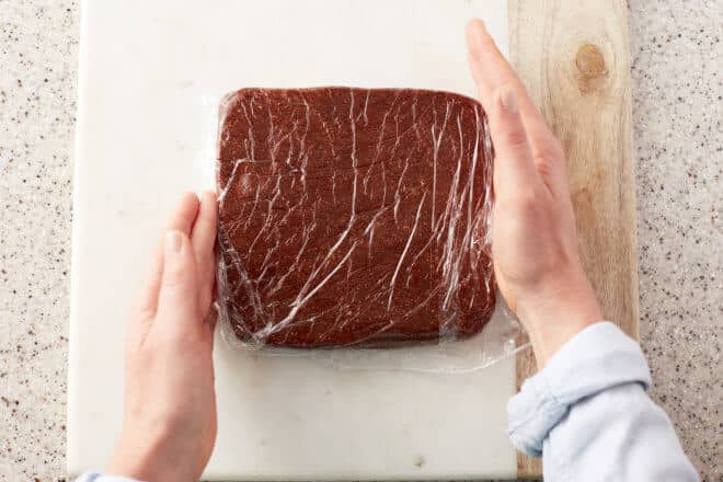 Brownie dough wrapped in plastic wrap