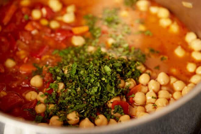 Chickpeas being added to Tagine