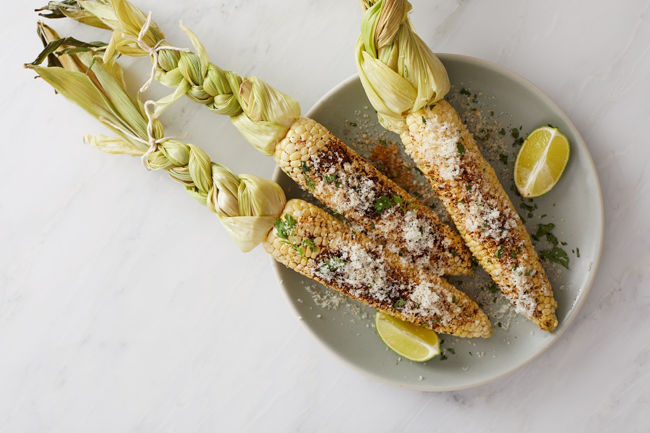 Mexican style street corn with chile, lime and cheese