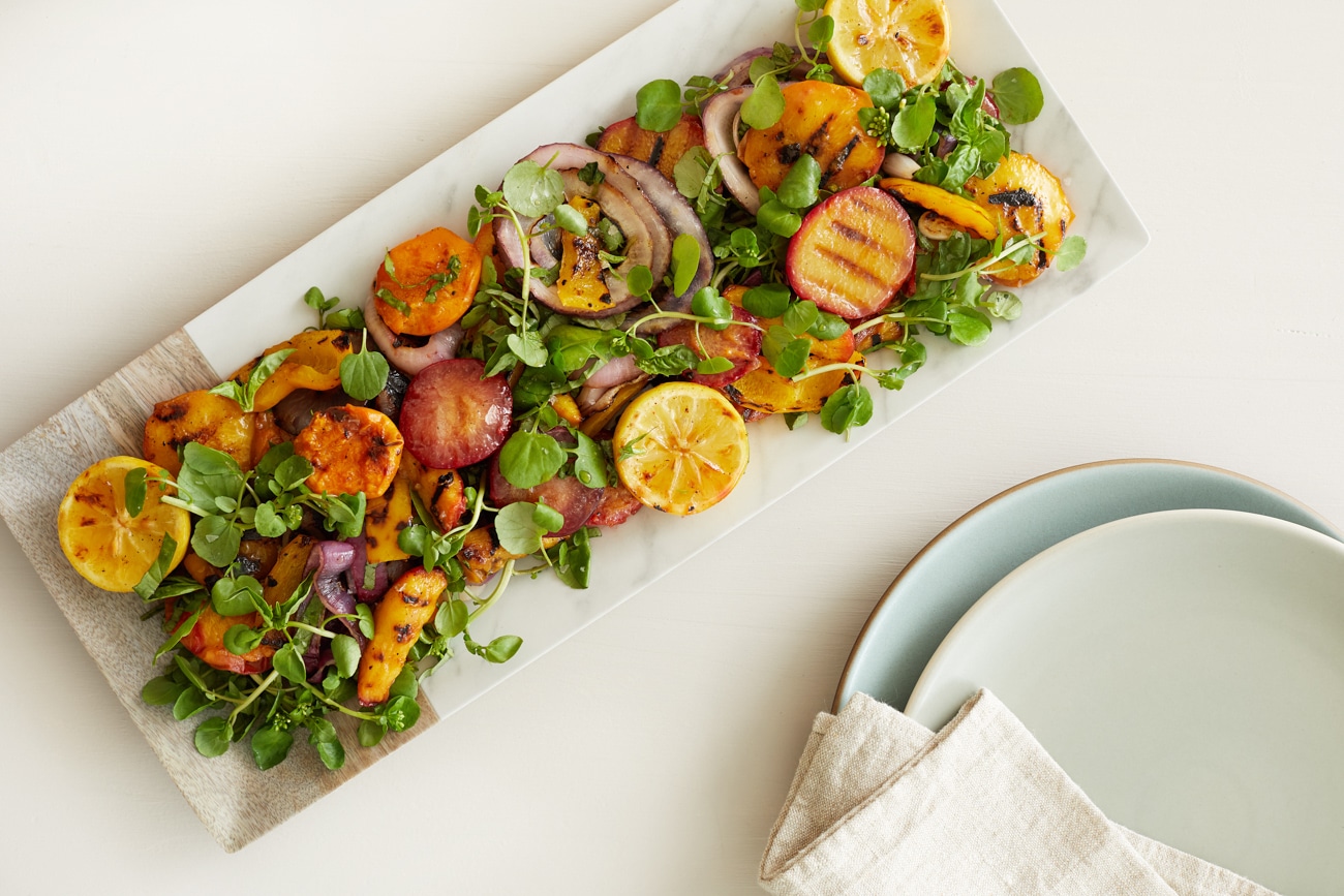 Summertime salad with grilled peaches