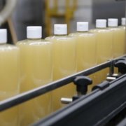 A row of Pure-Castile Liquid Soap before they have been labeled