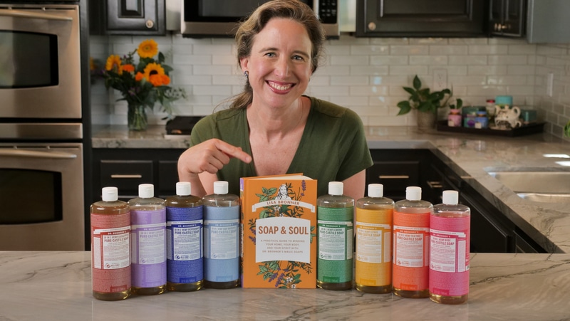 Lisa Bronner with book Soap & Soul and bottles of Soap